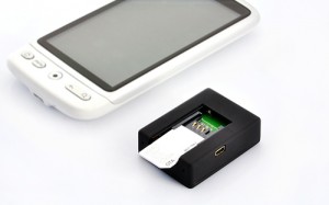 Motorola Handy und ein Triband-GSM-Sender